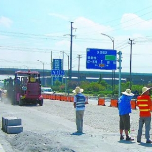 杭州萧山园区公路反复改建 百万公共财政资金浪费