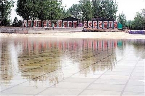 ����̶ӳ��ɽ�������־��� ֲ��԰�����˹���(ͼ)