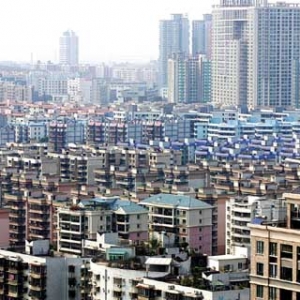 央行研究局报告称房地产行业拖累明年GDP降至7.1%