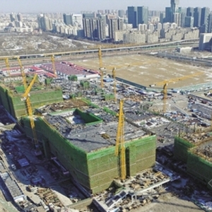 天津滨海新区文化中心两场馆主体封顶